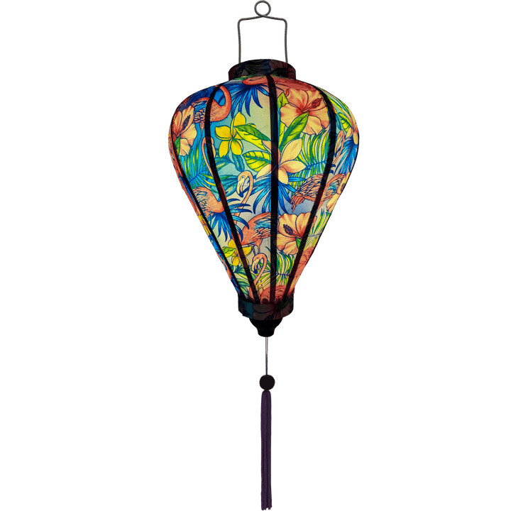 Glowing Vietnamese silk lantern with pink flamingos and flowers.