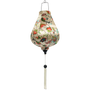 Garlic shaped Vietnamese Lantern with a beautiful illustration of flowers in blue, green and orange colours against cream background.