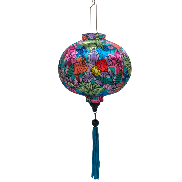 Round shaped lantern with blue tassel made with steel, bamboo and fabric with a vibrant and modern floral design on a blue background. 