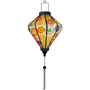 Glowing Diamond shaped lantern with beautiful illustration of flowers.