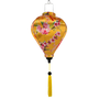 Vietnamese silk lantern with floral design on a yellow background