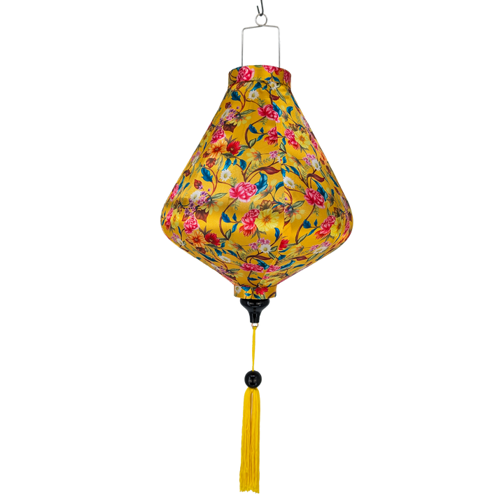 Teardrop shaped lantern with floral pattern on a yellow background with a yellow tassel 