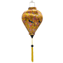 Balloon shaped Vietnamese Hoi An Lantern with yellow tassel and print of  yellow and bright blue and orange flycatcher birds sitting in a cherry tree set against a sunny yellow background. 