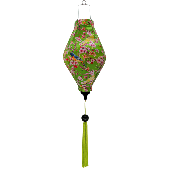 Tube shaped Vietnamese lantern featuring a lush green background with delicate cherry blossoms in full bloom with bright yellow canaries and striking blue and orange flycatchers perched in a tree.