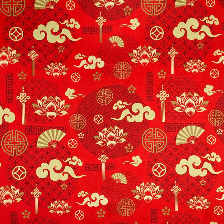 Polyester silk fabric with intricate golden clouds, delicate lotus flowers, elegant fans and symbols against red backdrop.