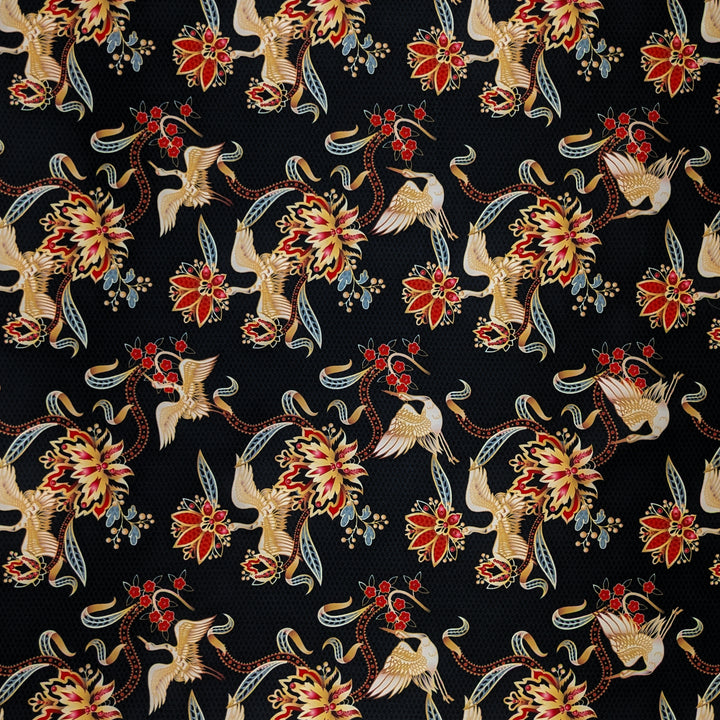 Polyester silk fabric for Vietnamese Hoi An Lanterns featuring golden cranes amongst red and gold lined flowers with subtle grey shimmer of a geometric pattern against black. 