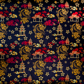 Gold dragons, pagodas, and red clouds on a black background.