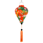 Gold fish and lotus flowers against bright orange background with matching orange tassel.