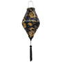 Tube shape Vietnamese silk lantern with black tassel featuring golden dragons and grey swirls on black background.