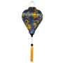Decorative lantern with blue and gold dragon design on a navy blue background
