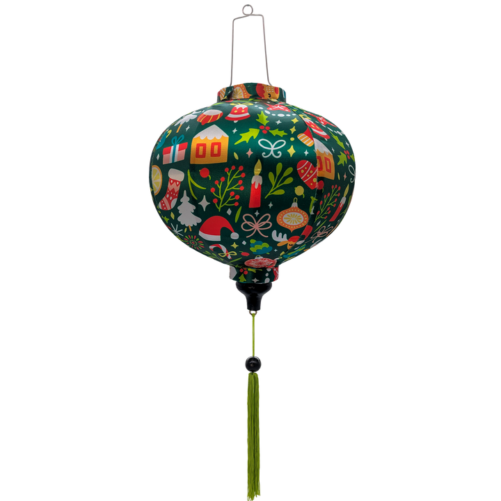Round shape Vietnamese silk lantern with rich emerald green background is adorned with charming holiday motifs such as gingerbread cookies, snowflakes, ornaments, reindeer, and presents, making it a perfect decoration for the holiday season.