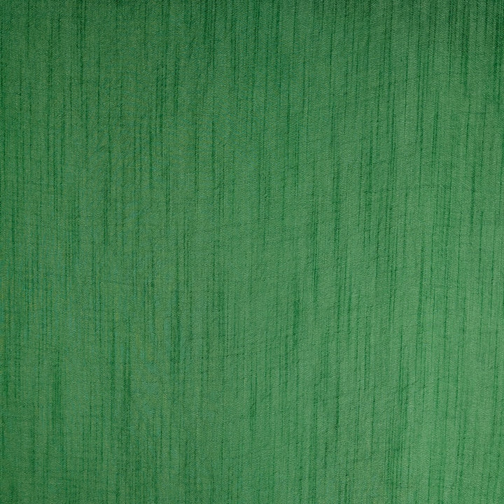 A close-up of a textured green polyester linen fabric with a fine linen weave pattern.