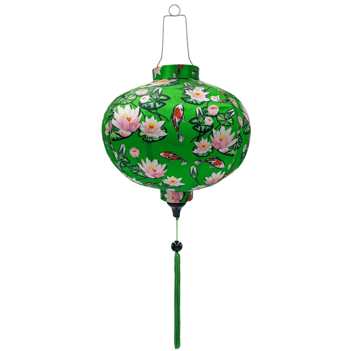 Round shaped Vietnamese lantern with green tassel featuring red and white koi fish swimming around white and pink lotus flowers on a green background.