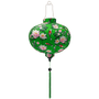 Round shaped Vietnamese lantern with green tassel featuring red and white koi fish swimming around white and pink lotus flowers on a green background.