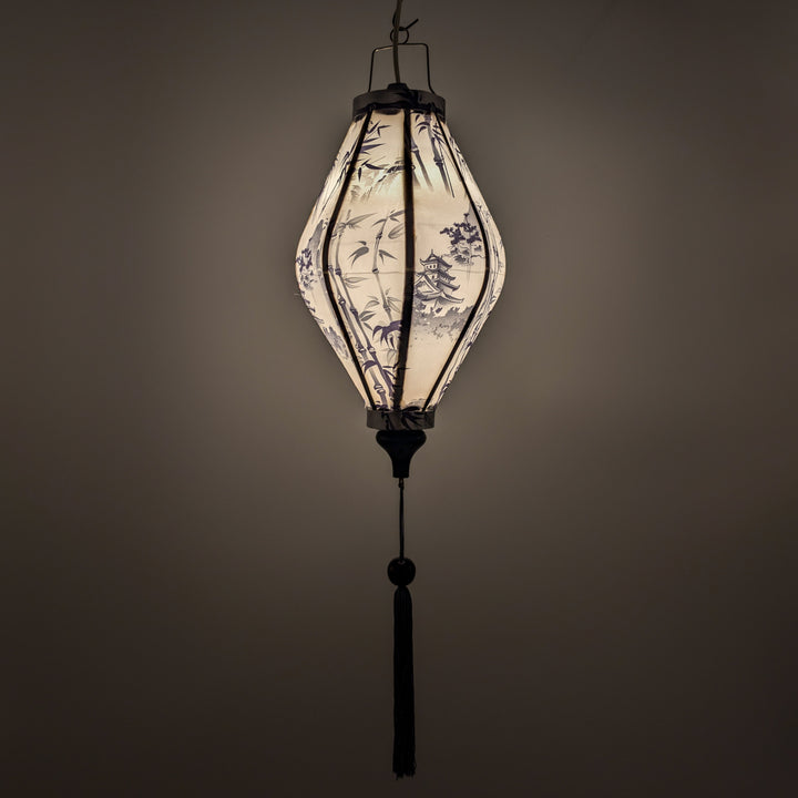 Glowing Tube shaped lantern with print of temples and bamboo in greyscale colours with grey tassel