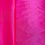 Close up of hot pink polyester silk fabric.