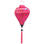 Balloon shaped lantern with pink tassel and fabric with a print of hummingbirds mid-flight hunting nectar from orange flowers against striking pink background.