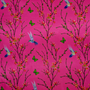 A close up of polyester silk fabric with a print of hummingbirds mid-flight. The hummingbirds, known as sunbirds in Asia, are hunting nectar from orange flowers against striking pink background.