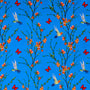 Polyester silk fabric featuring a print of hummingbirds in flight with red and pink flowers against bright blue silk. Used to create Vietnamese silk lanterns in Hoi An.