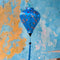Balloon shape Vietnamese silk lantern with hummingbirds on blue against an aging wall in Old Town, Hoi An.
