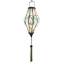 Glowing Tube shaped Vietnamese Hoi An lantern with green tassel.