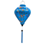 Balloon shape Vietnamese silk lantern featuring a print of hummingbirds in flight with red and pink flowers against bright blue silk.