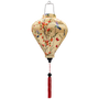 Balloon shape Vietnamese silk lantern made from steel, bamboo and fabric featuring a print of hummingbirds in flight with red and pink flowers against cream.