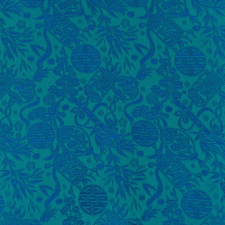 Teal blue patterned Jacquard silk fabric