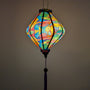 Glowing Lozenge shaped lantern with colourful geometric patterns
