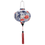 Round Vietnamese lantern with red tassels and a print featuring koi fish and red lotus flowers.