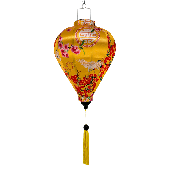 Hoi An silk lantern with floral and bird patterns on a yellow background with a matching yellow tassel
