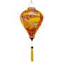 Hoi An silk lantern with floral and bird patterns on a yellow background with a matching yellow tassel