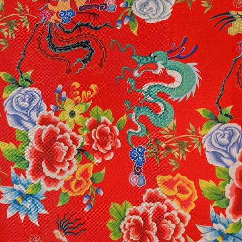Dragon and floral pattern on red fabric
