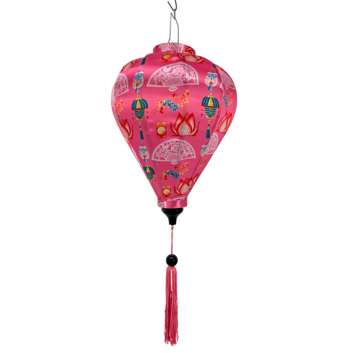 Silk lantern with colourful patterns on a pink background