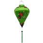 Round shaped lantern with green tassel with love birds sitting in a tree with red and yellow flowers on a green background.