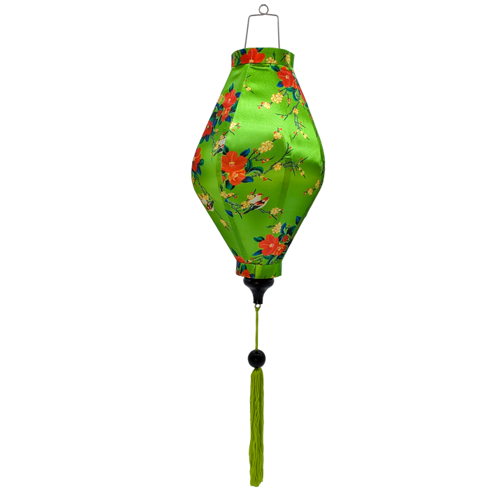 Tube shaped lantern with green tassel and love birds on green backdrop.