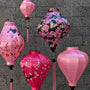 Mix and match of plain silk lanterns, hand painted lanterns and prints. 