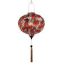 Hanging round lantern with koi fish and lotus flowers against gold.