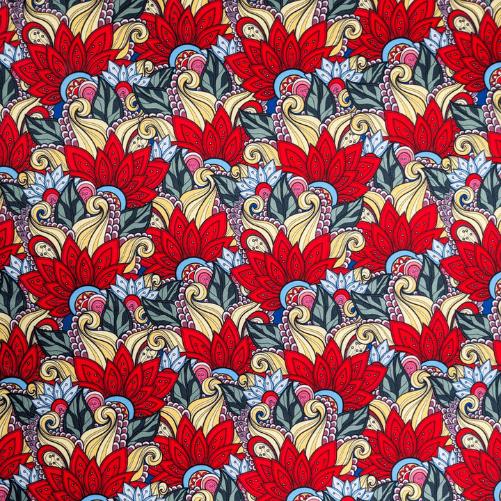 Polyester silk fabric with delicate paisley and feather patterns, perfect for elegant home decor.