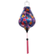Garlic shaped Vietnamese lantern with pink tassel and vibrant hibiscus flowers in on bright pink background. 