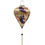Balloon shaped lantern with white tassel and print of birds in flight, large flamboyant peacocks, dainty lanterns hanging on branches with pink and red flower blossoms on a cream background.