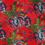 Close up of polyester silk fabric adorned with intricate prints of dragons, peacocks, and butterflies against a striking red background.