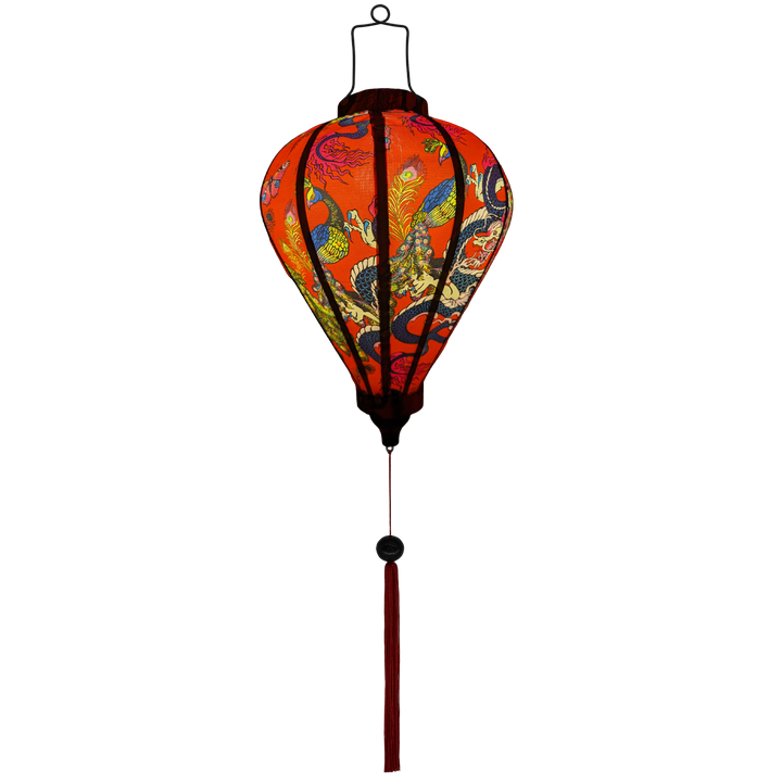 Glowing Balloon shaped lantern with red tassel adorned with intricate prints of dragons, peacocks, and butterflies against a striking red background.