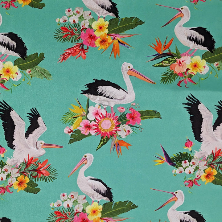 Polyester silk fabric with majestic pelicans, exotic blooms of proteas, orchids, and hibiscus for skilled Vietnamese artisans to hand make beautiful lanterns.