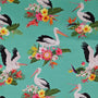 Polyester silk fabric with majestic pelicans, exotic blooms of proteas, orchids, and hibiscus for skilled Vietnamese artisans to hand make beautiful lanterns.