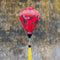 Balloon shape Vietnamese silk lantern in Old Town featuring phoenix birds in flight with green, white and orange wings flying amongst blue and yellow flowers on bold orange background. 