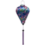 Balloon shaped Vietnamese lantern with  print of pink flamingos, hibiscus, and frangipani flowers on a blue background. 