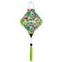 Hanging handmade Lozenge shaped lantern with flamingo and floral pattern on a white background with lime colour tassel