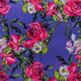 Polyester silk fabric with a print of pink roses and purple flowers against gorgeous purple background perfect for home decor!