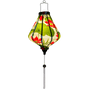 Glowing Vietnamese lantern with lotus flowers.